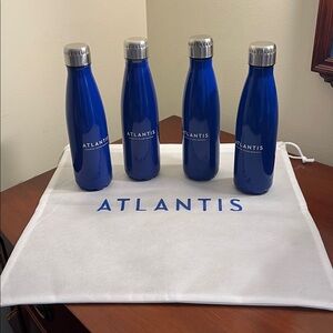 Four Atlantis (Bahamas) water bottles and large drawstring bag